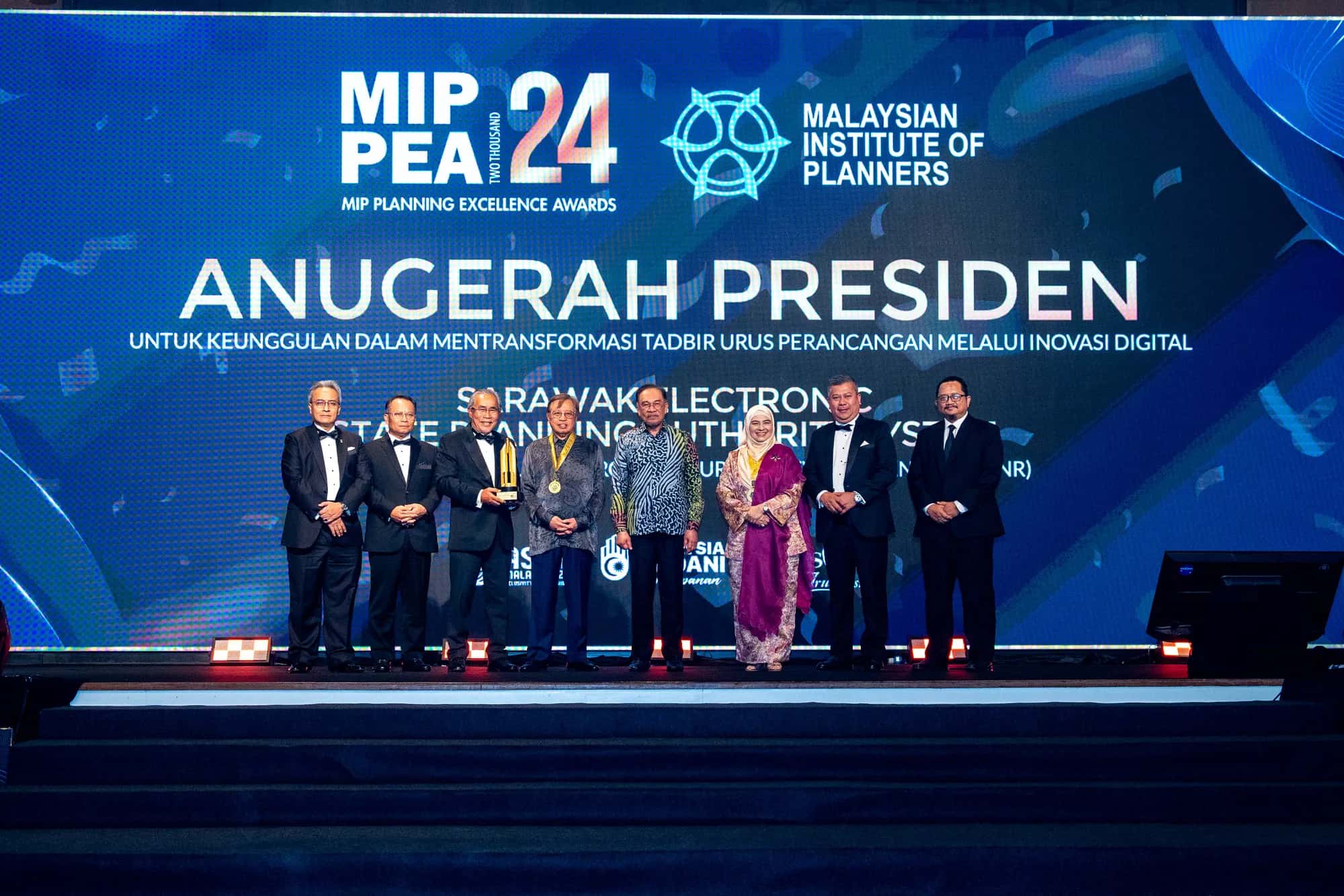 Corporate award recipients on stage