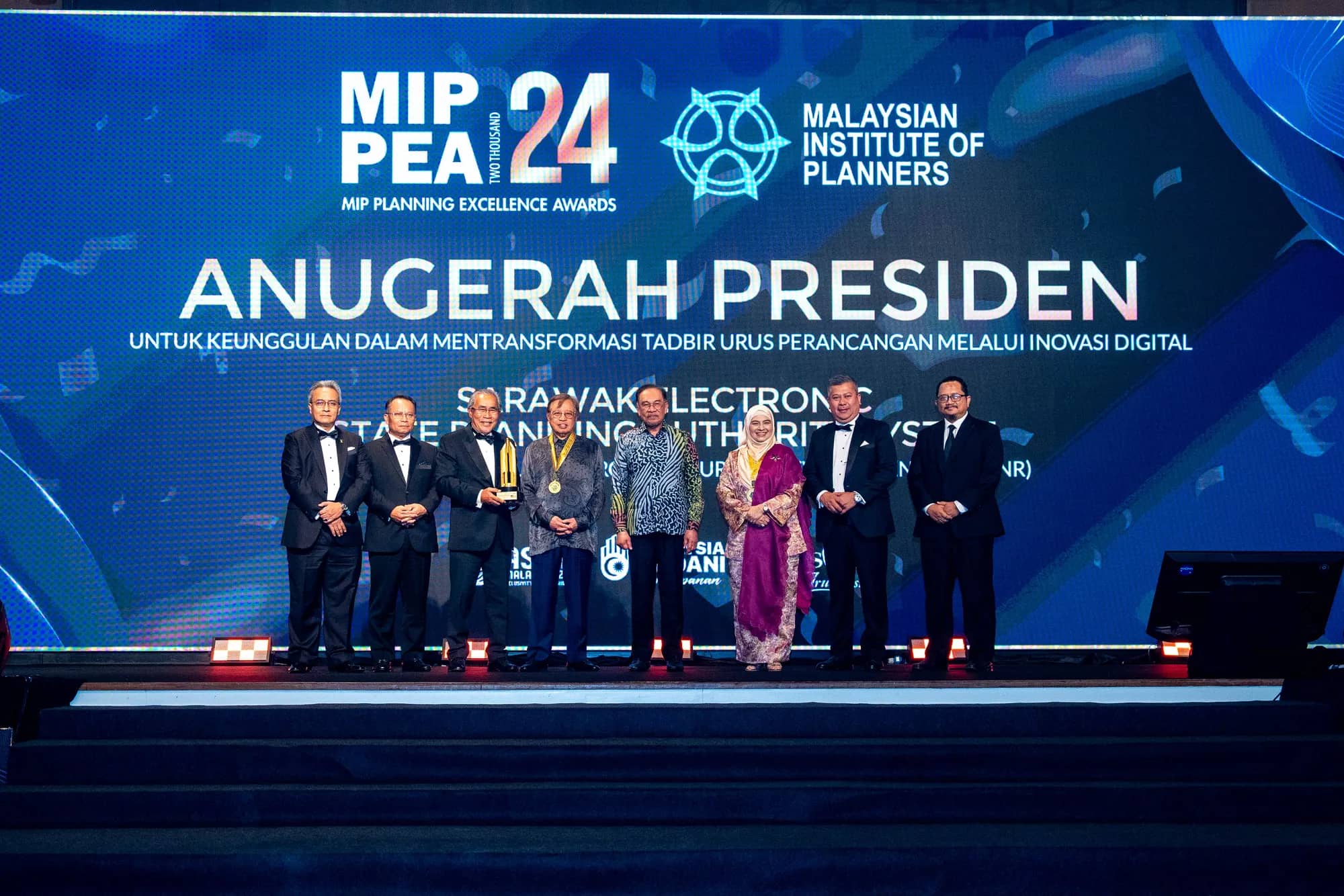 Corporate award recipients on stage